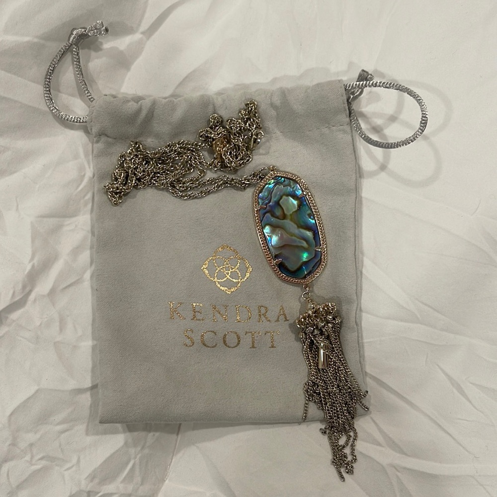Kendra Scott Rayne Gold long pendant necklace in abalone Shell.